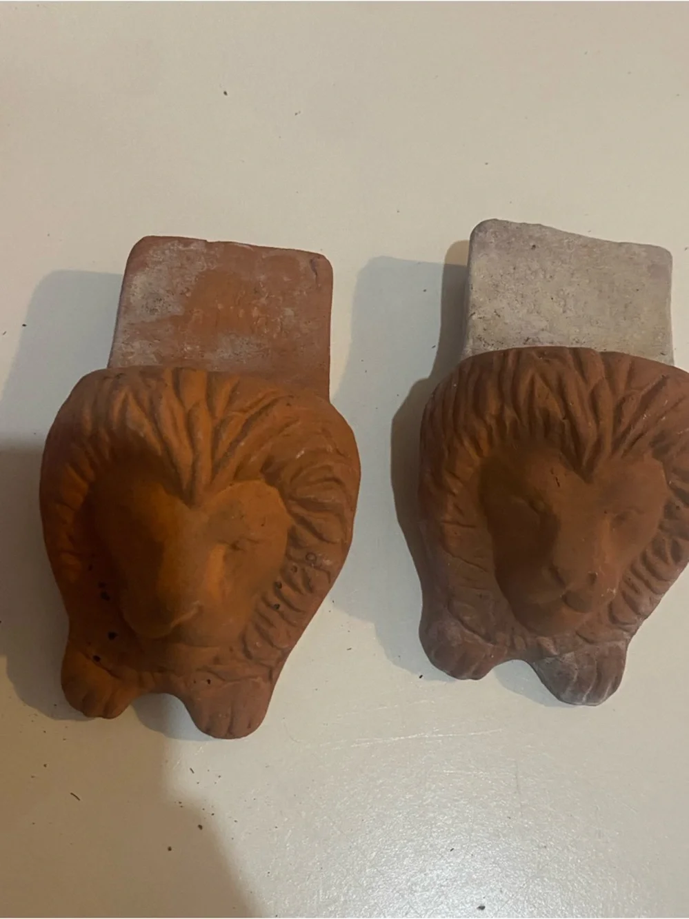 Terracotta Lion Head red / orange Home Accent terracotta lion head planter feet